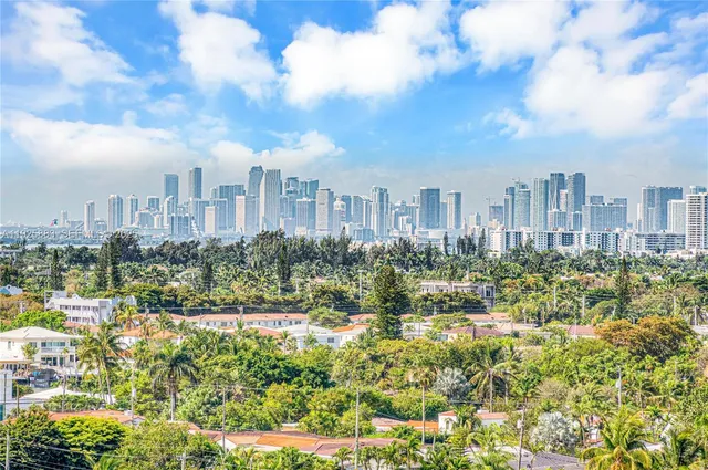 a view of a city with tall buildings