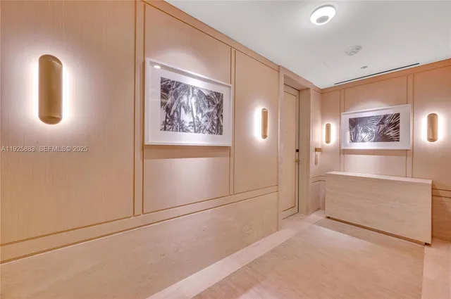 a view of a hallway with front door