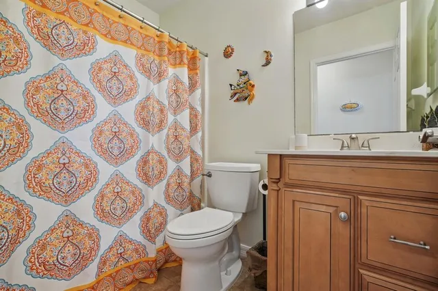 a view of a backyard with sitting area