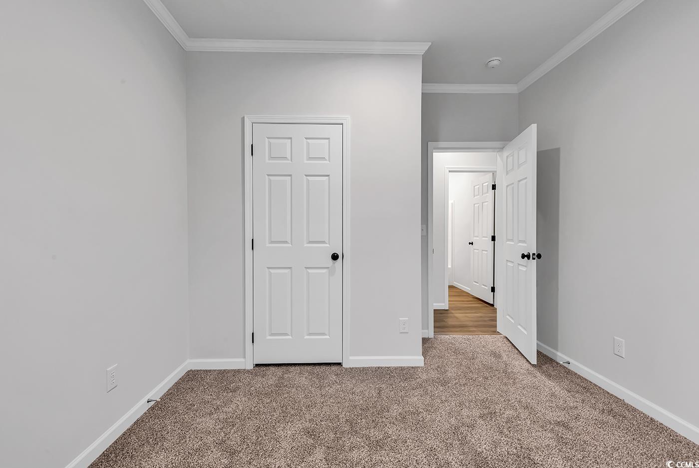 1529 Bucksport Road Conway, SC 29527 - Photo 19 of 31 Carpeted bedroom with ornamental molding and recessed lighting