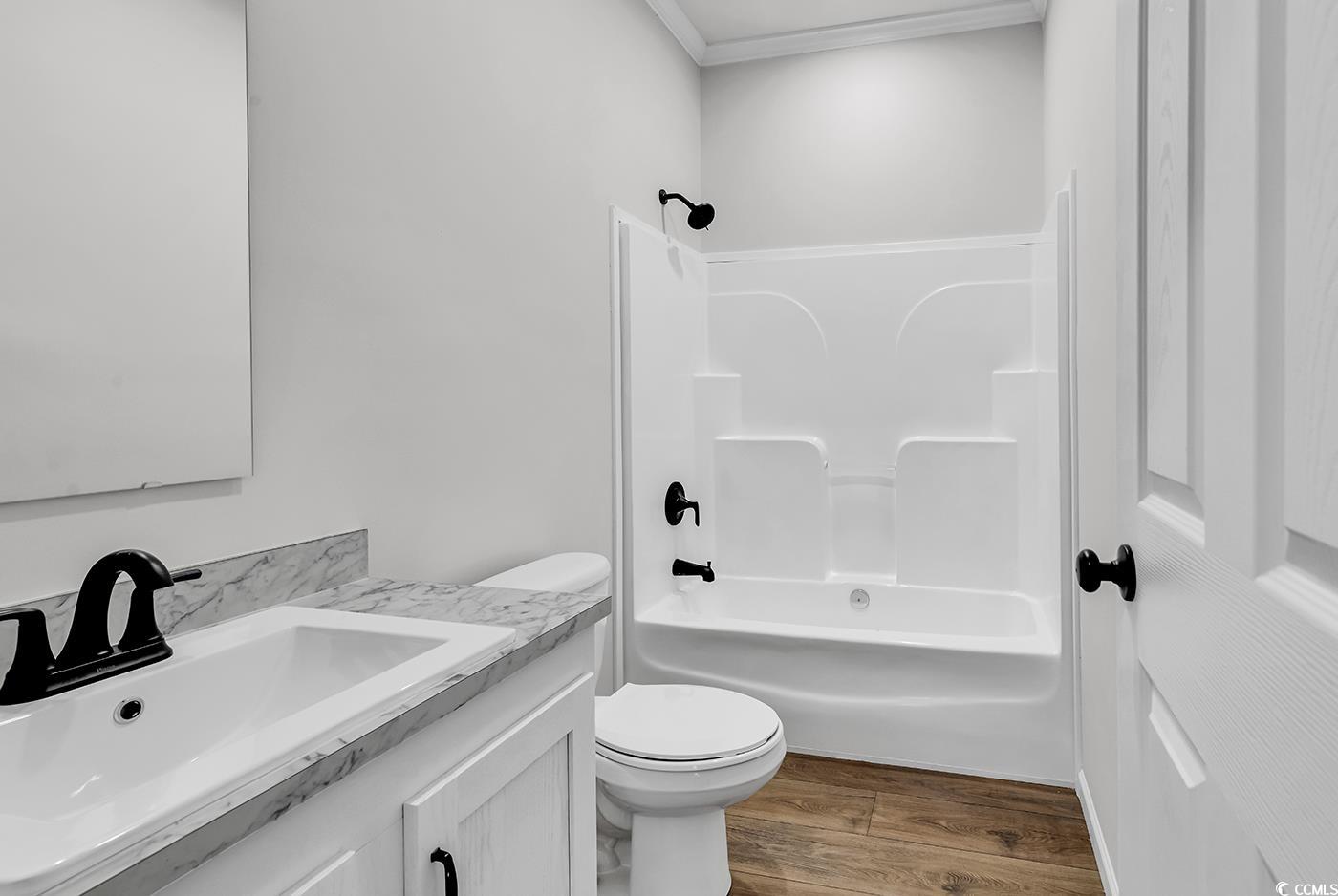 1529 Bucksport Road Conway, SC 29527 - Photo 20 of 31 Unfurnished bedroom featuring carpet flooring and crown molding