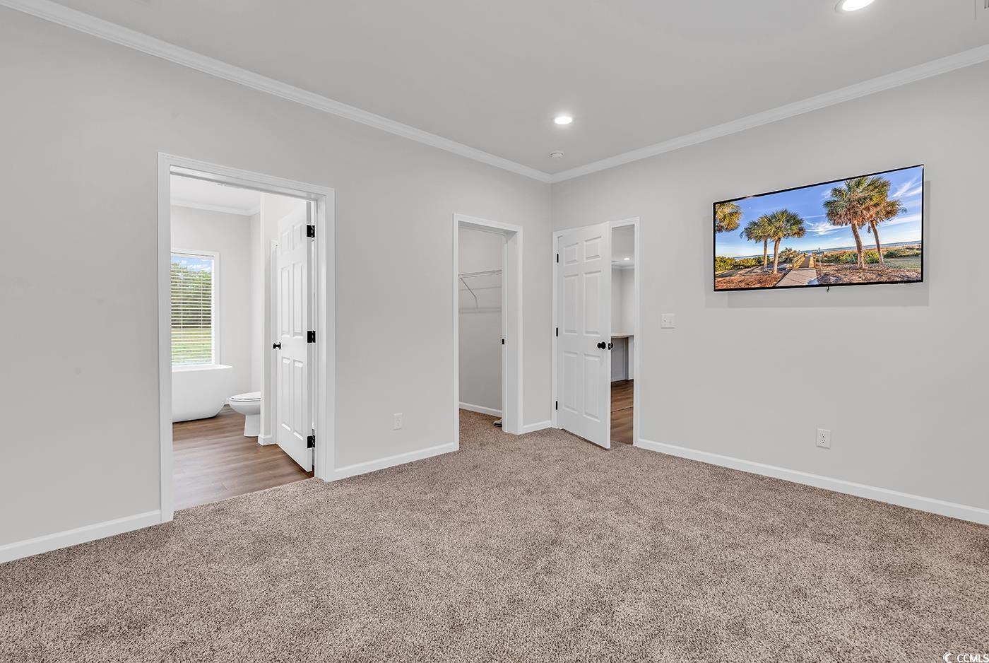 1529 Bucksport Road Conway, SC 29527 - Photo 25 of 31 Master Bedroom featuring ornamental molding, light carpet, and recessed lighting