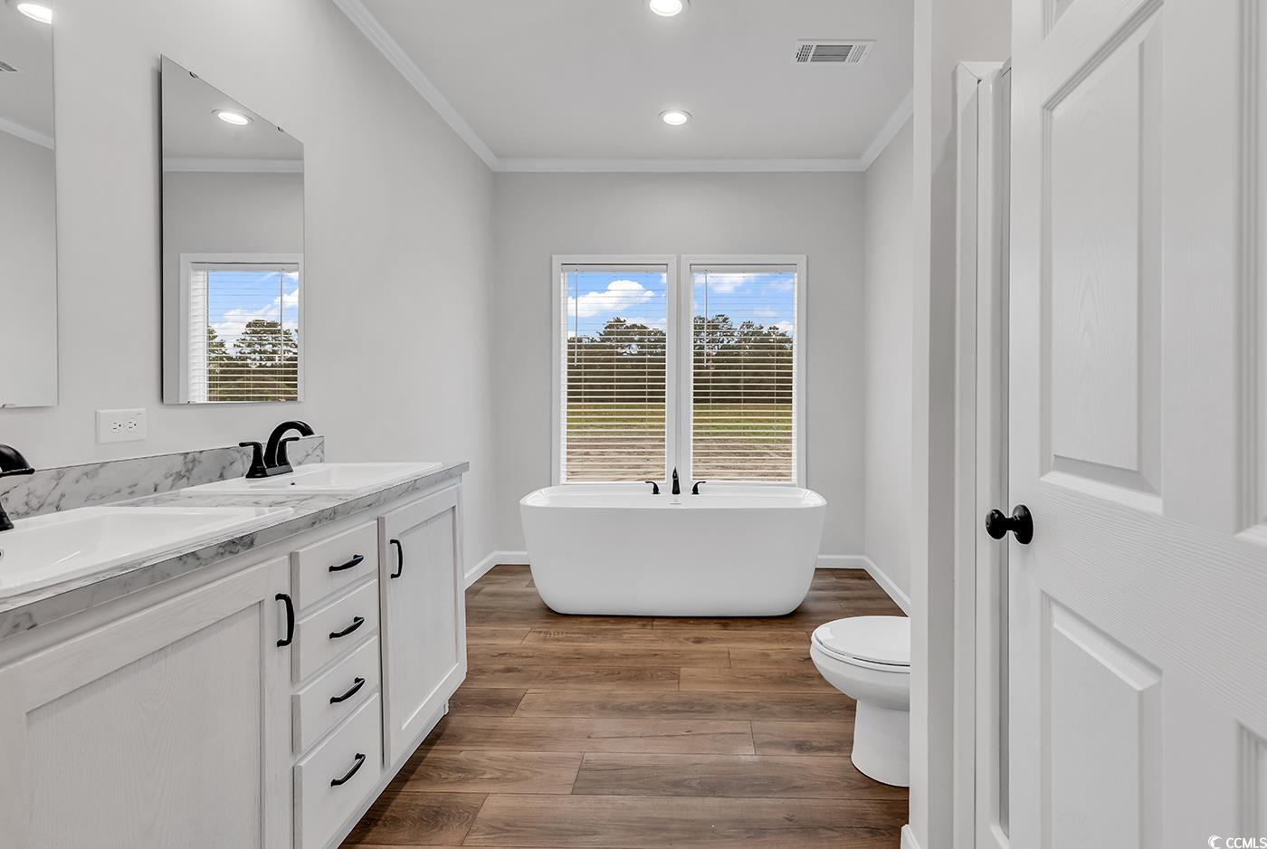 1529 Bucksport Road Conway, SC 29527 - Photo 27 of 31 Bedroom featuring ornamental molding, light colored carpet, and recessed lighting