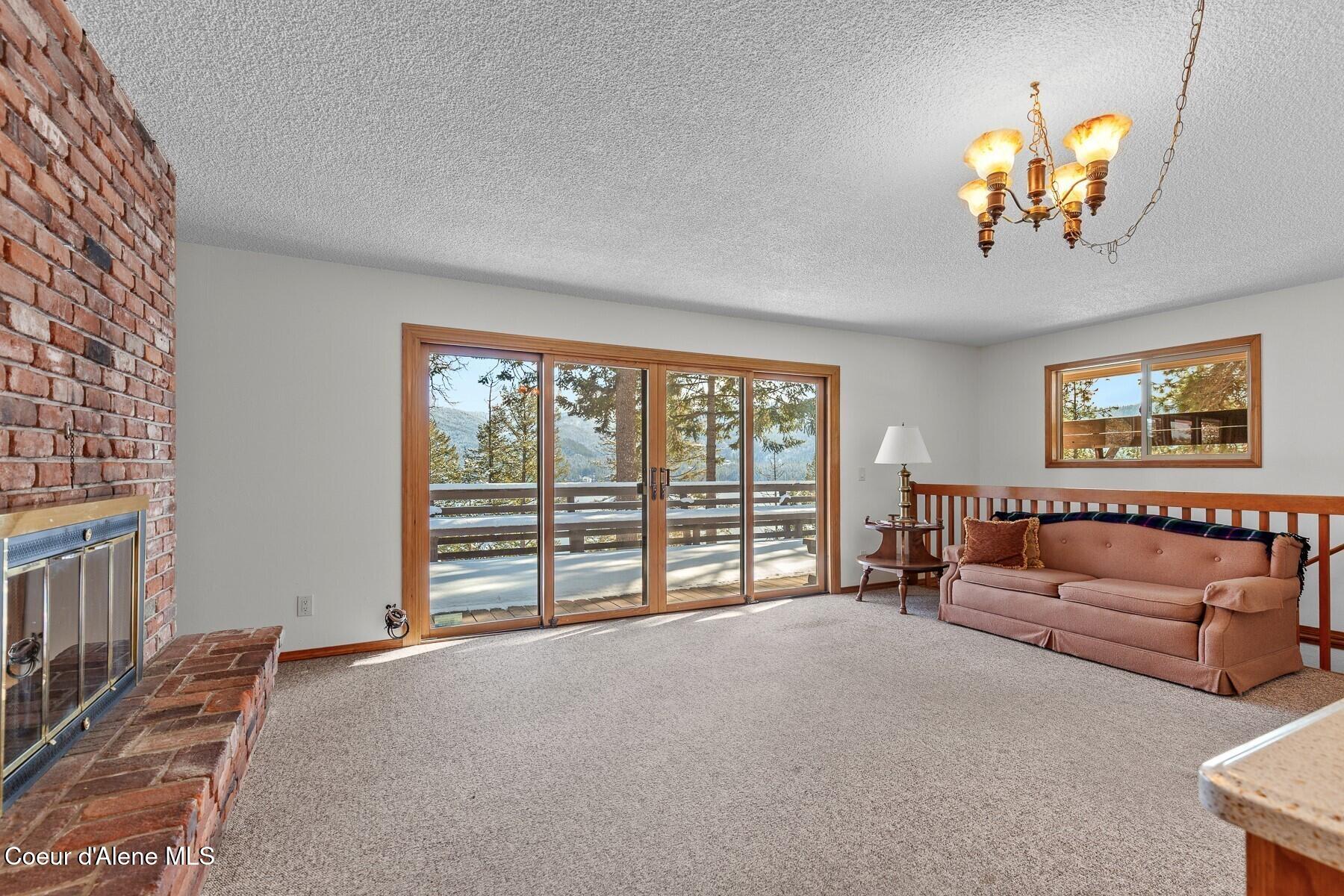 5977 East McMahon Road Hayden, ID 83835 - Photo 6 of 39 Deck Access & Mountain Views