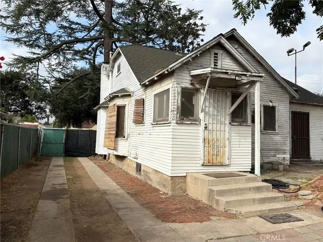 a front view of a house with a garage