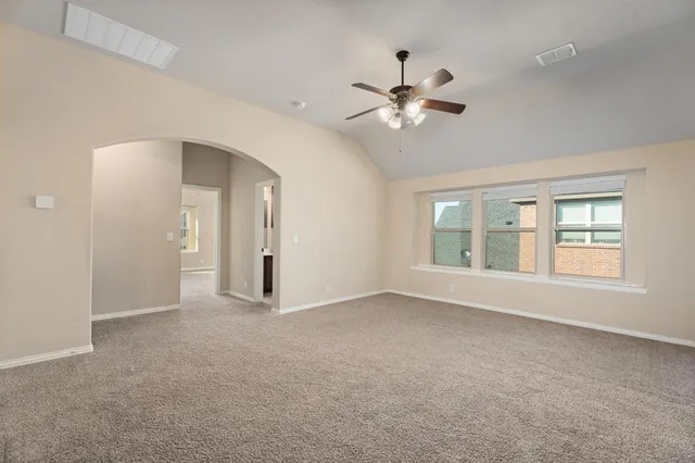 a bathroom with a double vanity sink and mirror