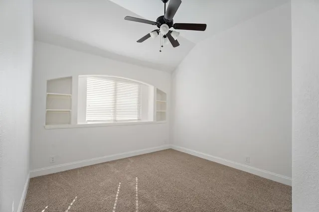 a view of a room with a chandelier