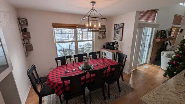 a view of a dining room with furniture window and outside view