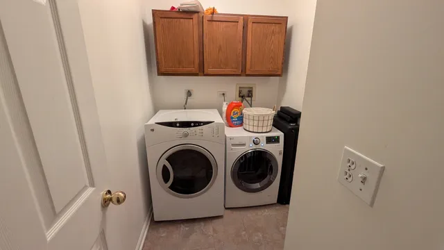 a utility room with dryer and washer