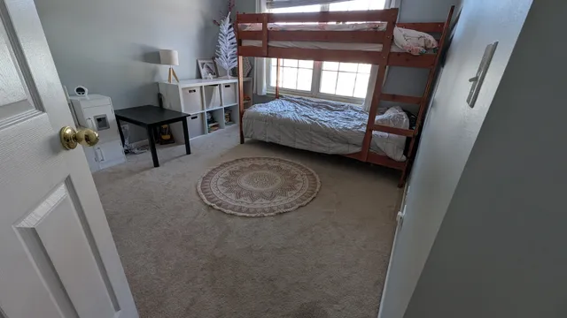 a view of livingroom with furniture and windows