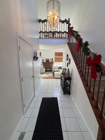 a view of entryway with a front door