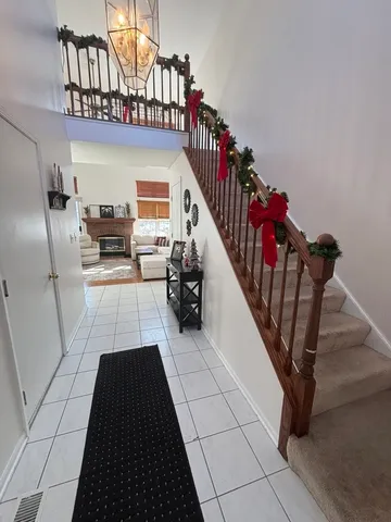 a view of entryway livingroom and hall