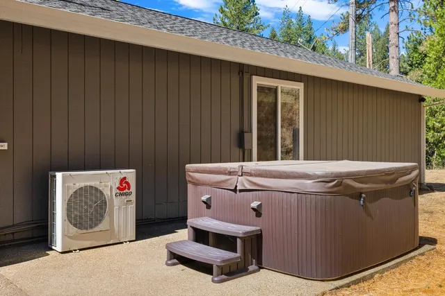 a aerial view of residential house with swimming pool