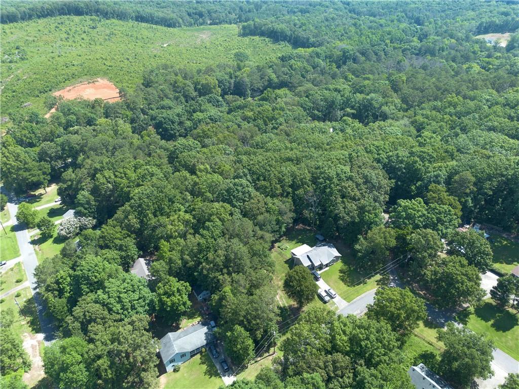 1217 Mission Road Southwest Cartersville, GA 30120 - Photo 9 of 18 a aerial view of a house with lots of trees