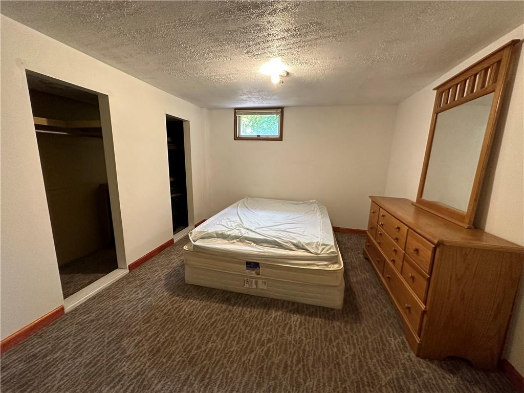 175 Fair Road Indiana, PA 15701 - Photo 13 of 21 a bedroom with a bed and a mirror