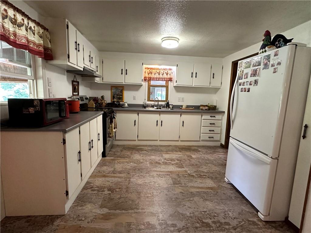 175 Fair Road Indiana, PA 15701 - Photo 2 of 21 a kitchen with stainless steel appliances a refrigerator sink and cabinets