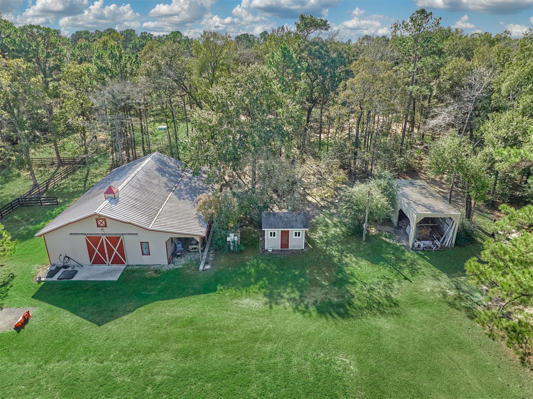 0 Koenig Lane Conroe, TX 77384 - Photo 12 of 19 Aerial view of barn - parcel to the east is owned by private owner and property to the west owned/occupied by seller.