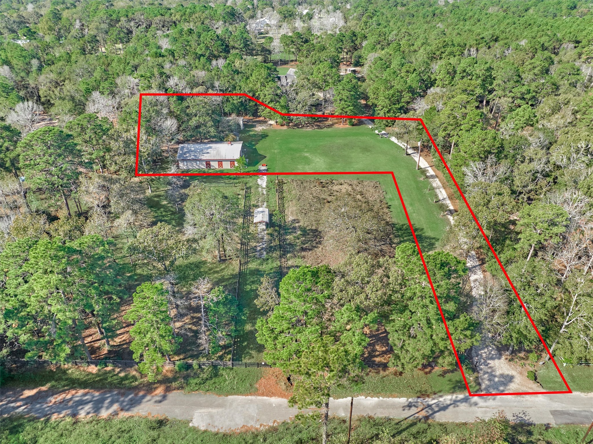 0 Koenig Lane Conroe, TX 77384 - Photo 10 of 19 1.5 acres of cleared land tucked alongside Jones State Forest, is ready to build! Quiet, unrestricted property zoned to The Woodlands schools is conveniently located just minutes from 1488, I-45 and nearby amenities!