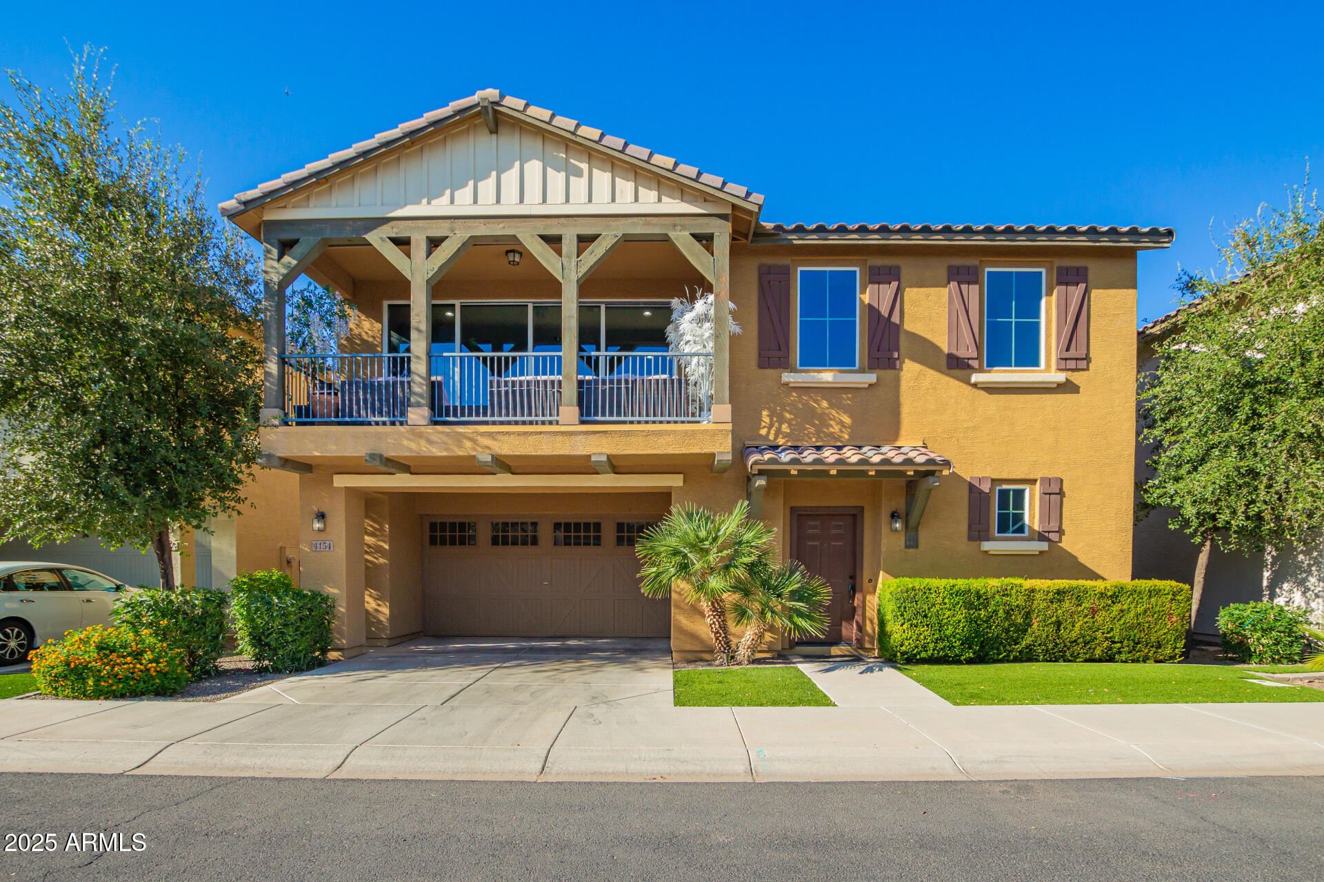 front view of a house with a yard