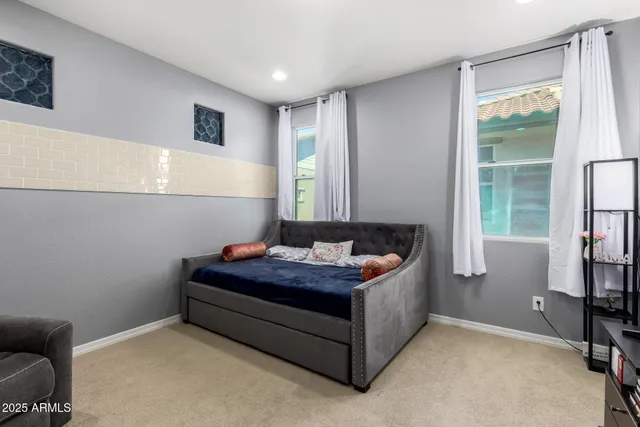 a room with a bed and a window