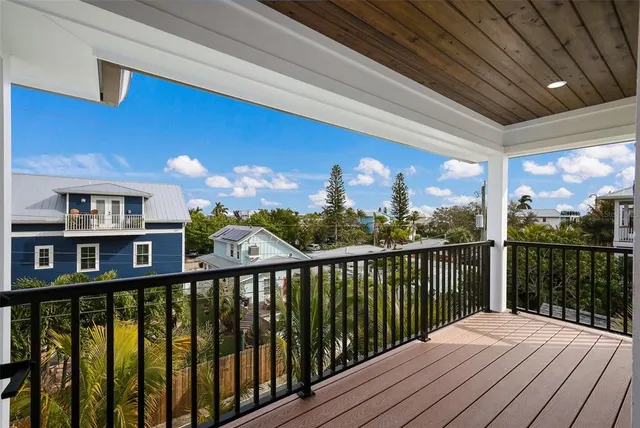 an aerial view of a city with ocean view