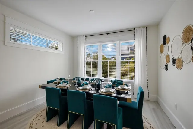 a bedroom with a bed and a television