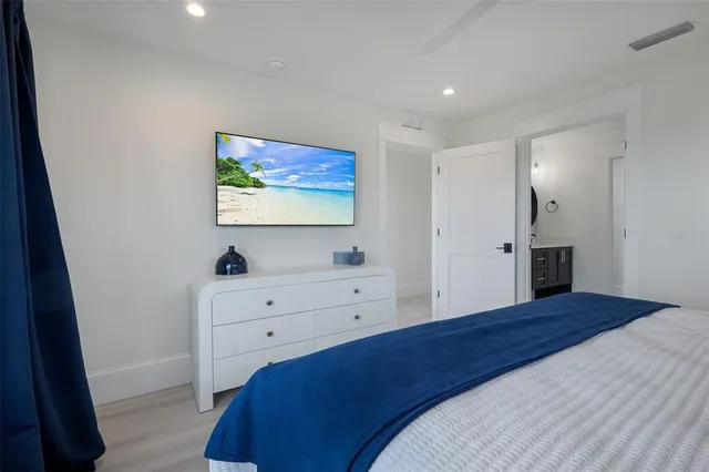 a view of a hallway with washer and dryer