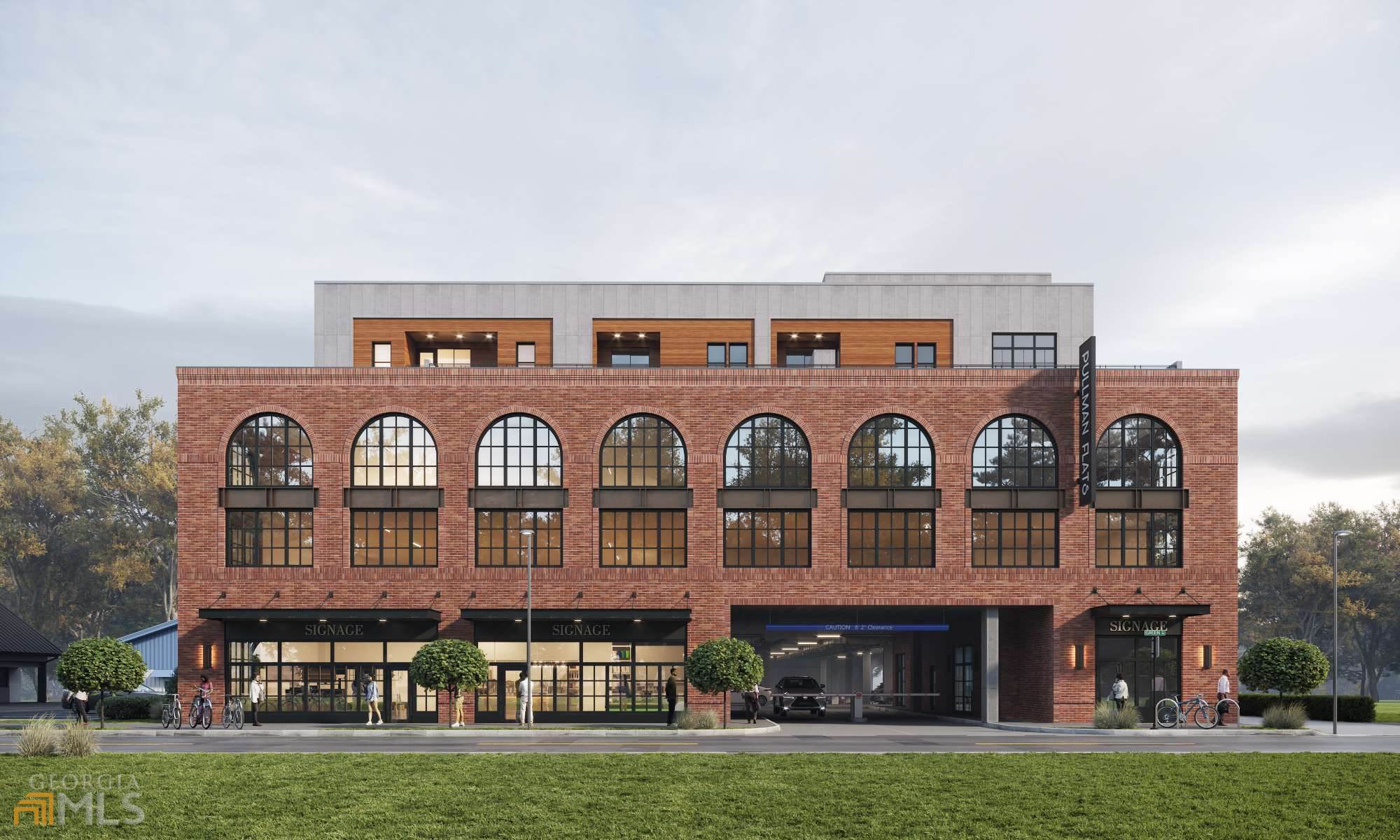 a front view of residential houses with yard