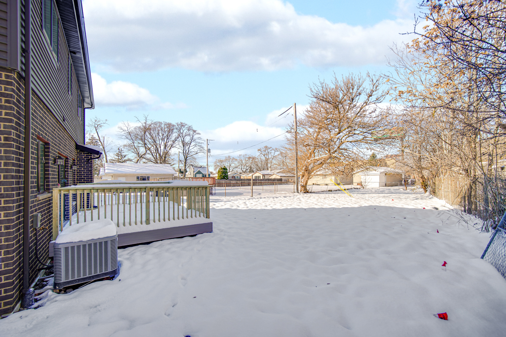 6532 West 112th Street Worth, IL 60482 - Photo 22 of 27 a view of balcony with wooden fence