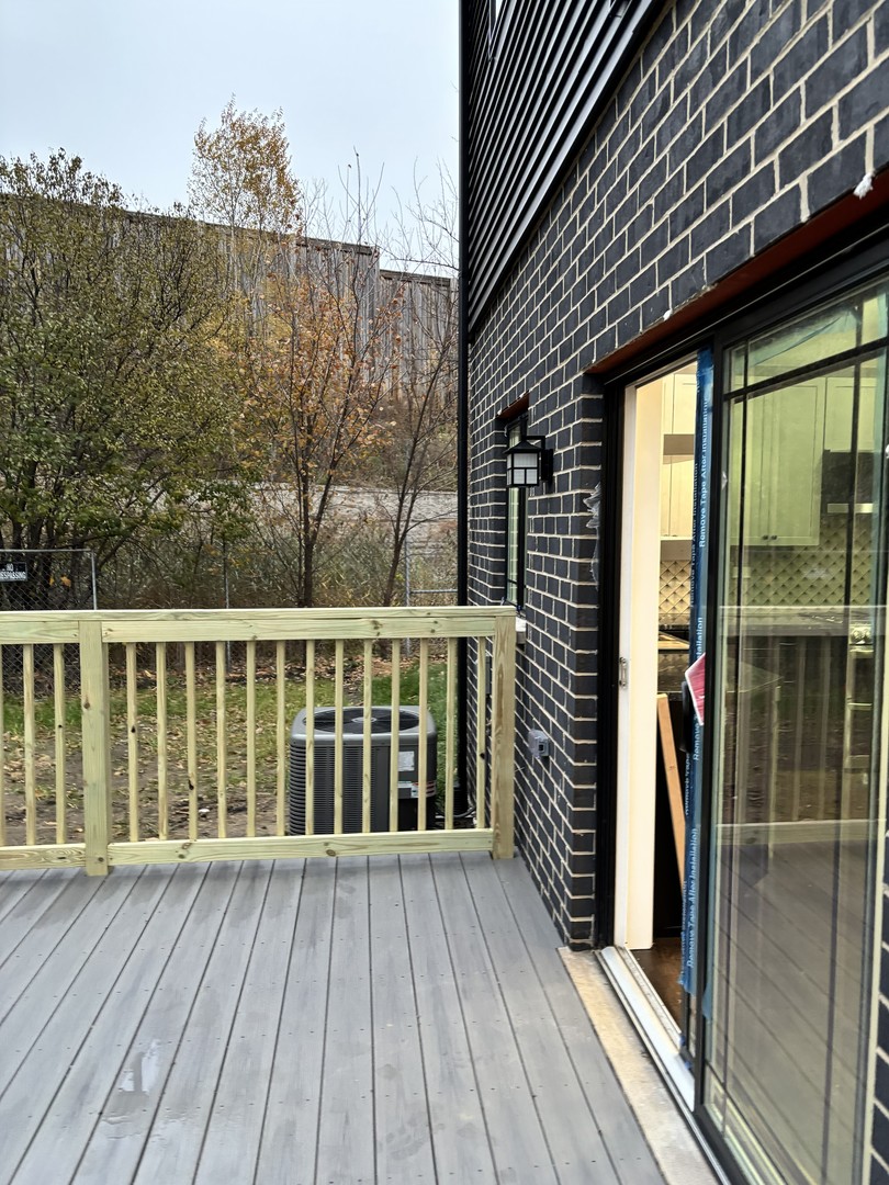 6532 West 112th Street Worth, IL 60482 - Photo 23 of 27 a view of a house with a balcony