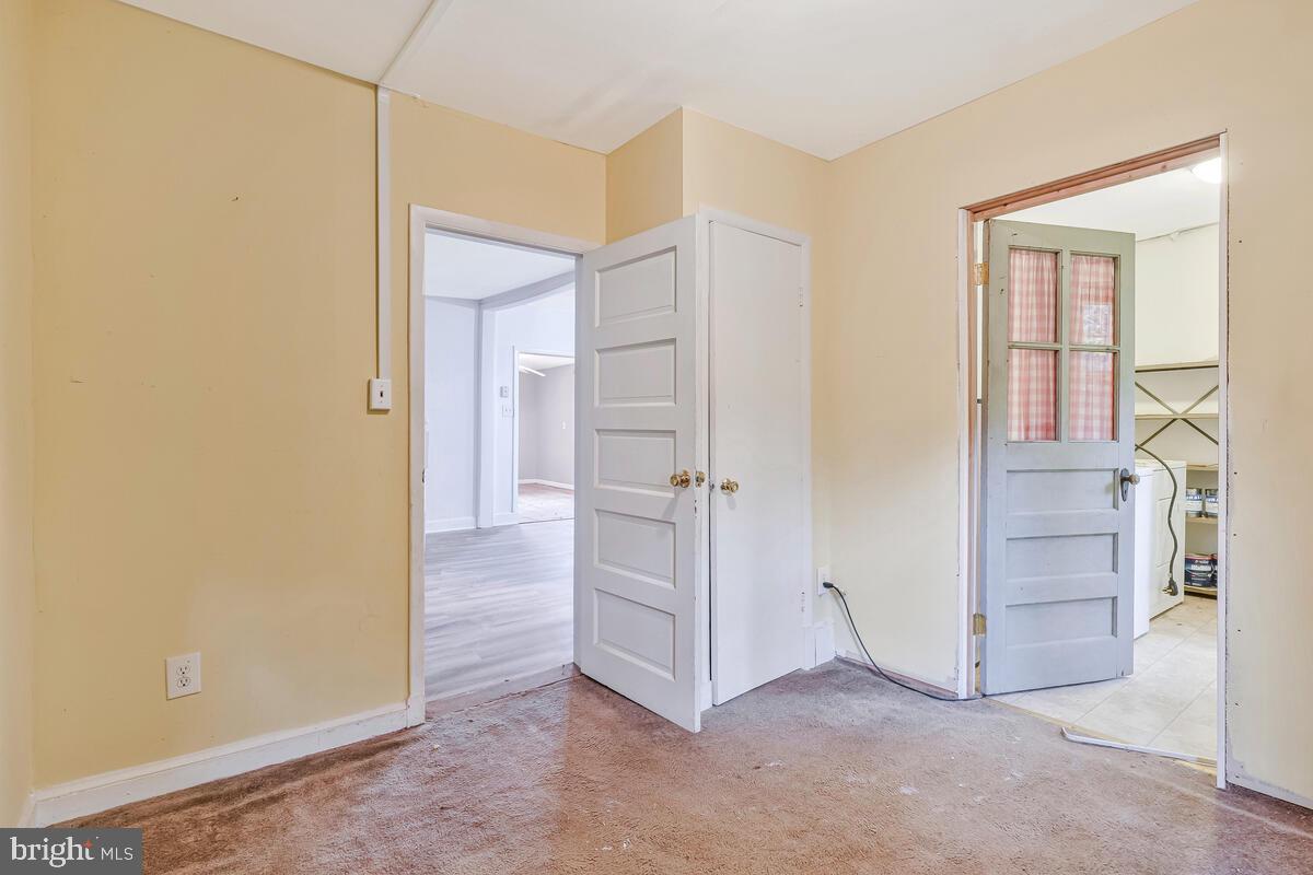 38888 Reeves Road Mechanicsville, MD 20659 - Photo 20 of 50 an empty room with closet and windows