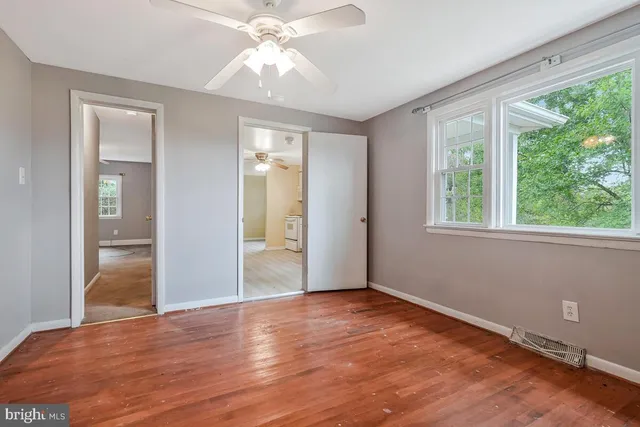 a room with furniture and a window