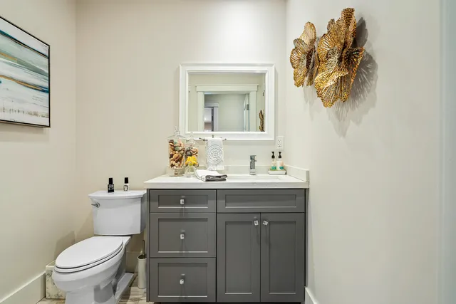 a spacious bathroom with a bathtub and sink