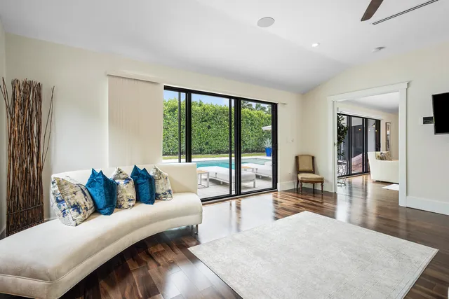 an aerial view of a house with a lake view