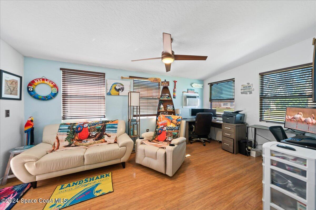 1509 Hedrick Drive Melbourne, FL 32901 - Photo 9 of 20 a bedroom with furniture and a window