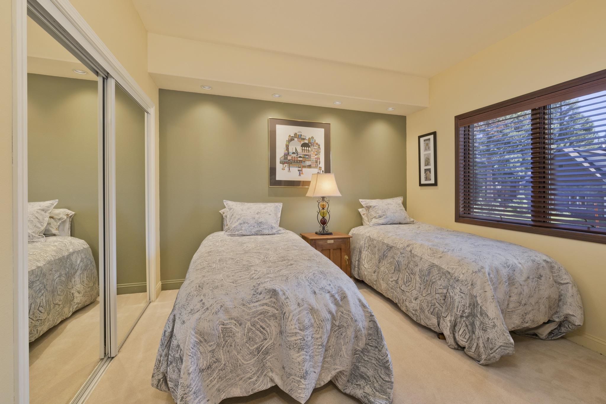 378 Ridge Way Mammoth Lakes, CA 93546 - Photo 32 of 43 Carpeted room featuring a mirrored closet, recessed lighting, and a wood-framed window with horizontal blinds