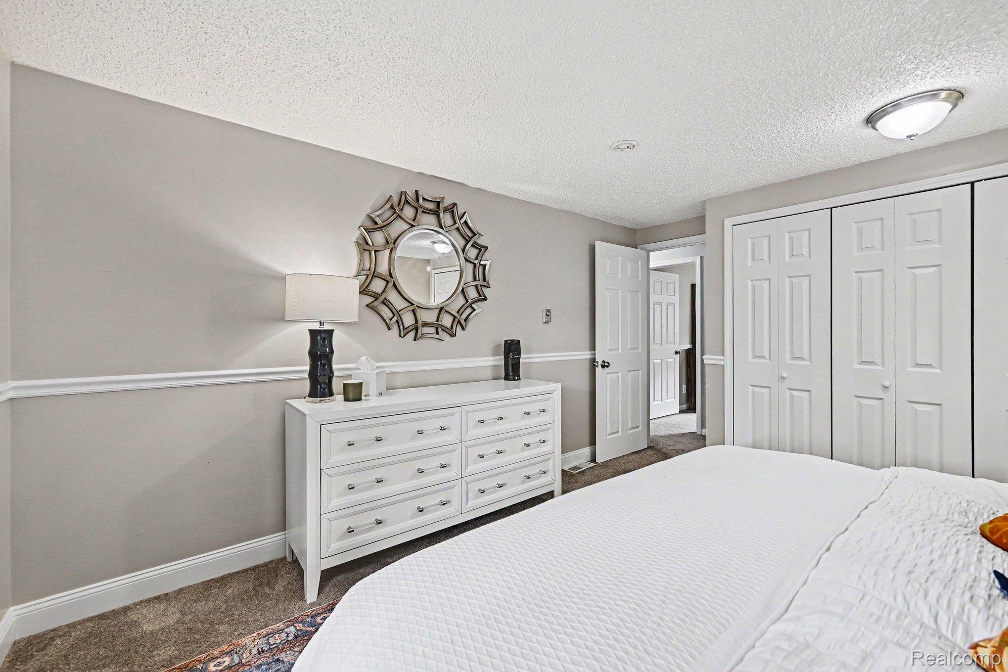 2104 Highfield Road Waterford, MI 48329 - Photo 13 of 38 King sized bed, ample closet storage, and dressers