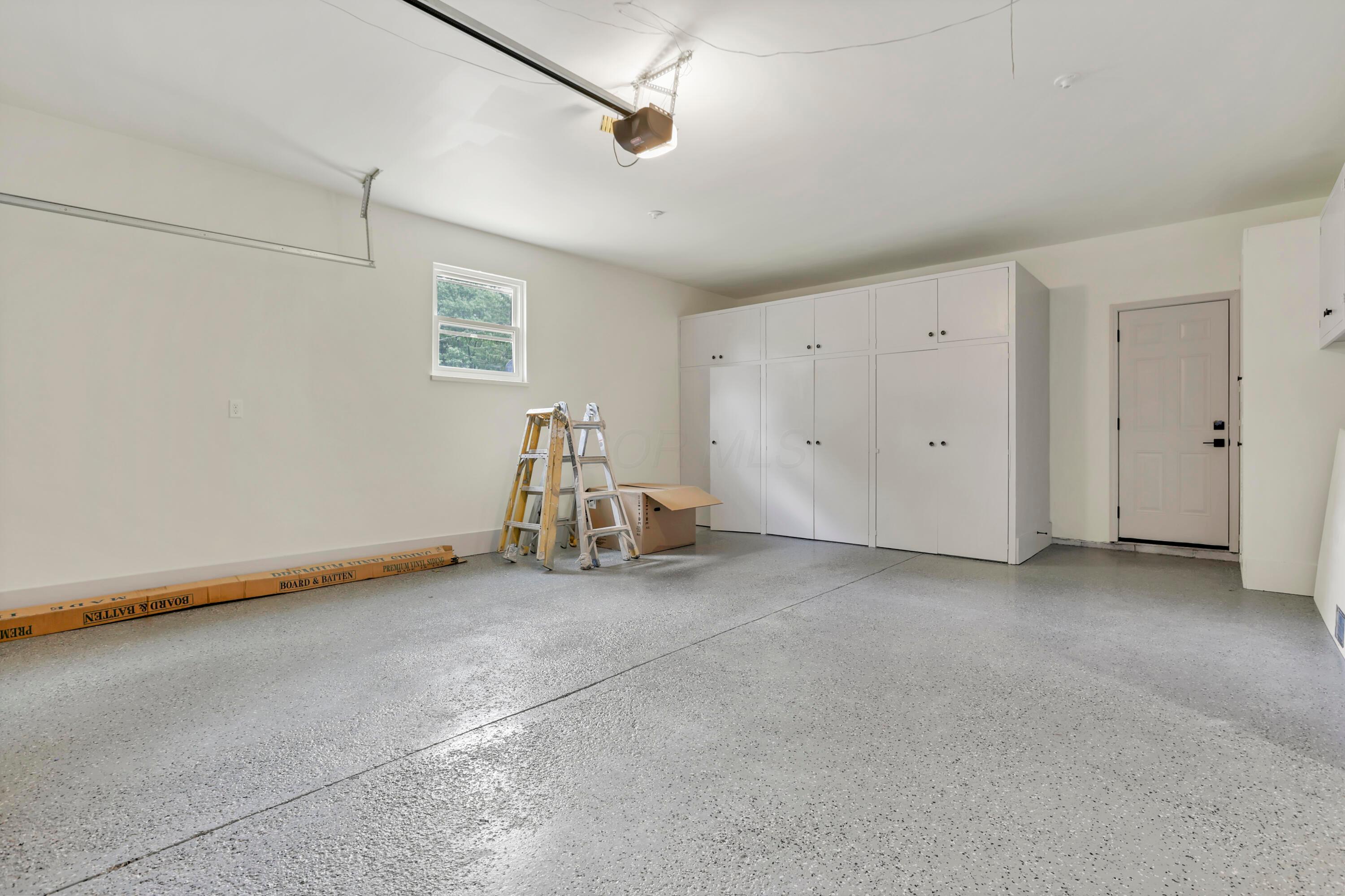 1285 Kingsgate Road Columbus, OH 43221 - Photo 49 of 56 Garage interior - has tons of built ins for storage.