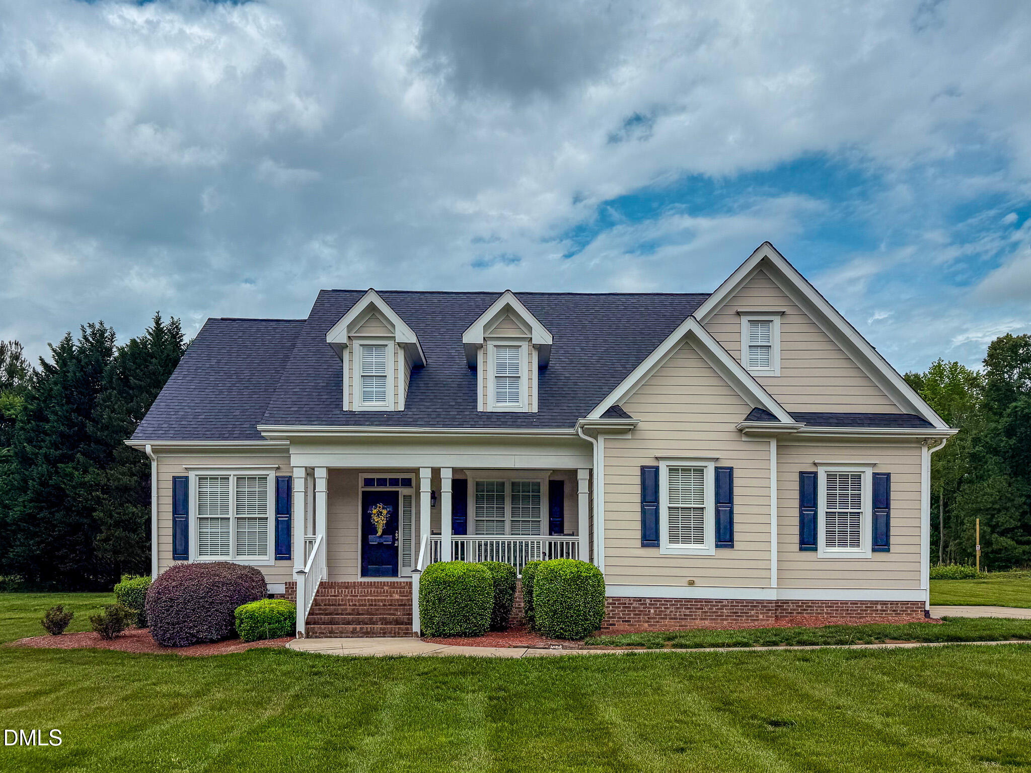 115 Duncan Plantation Road Timberlake, NC 27583 - Photo 47 of 48 a front view of a house with a yard