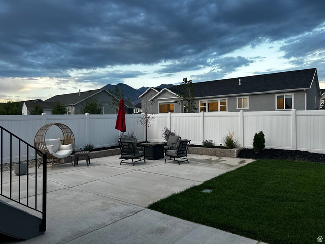 315 South Sherman Street Mapleton, UT 84664 - Photo 26 of 30 Expansive concrete patio complemented by a manicured lawn