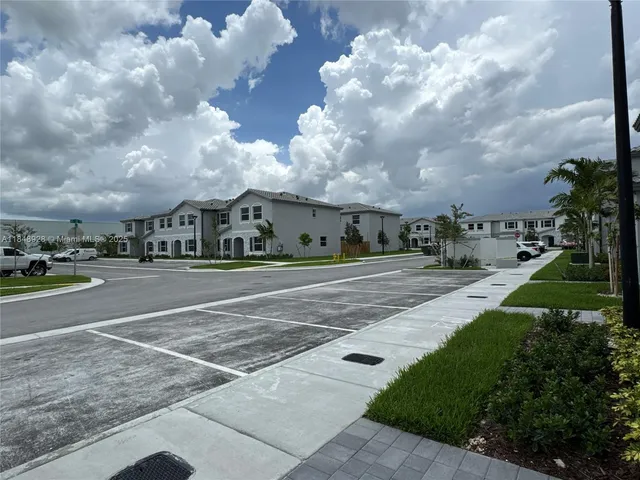 a view of street with houses