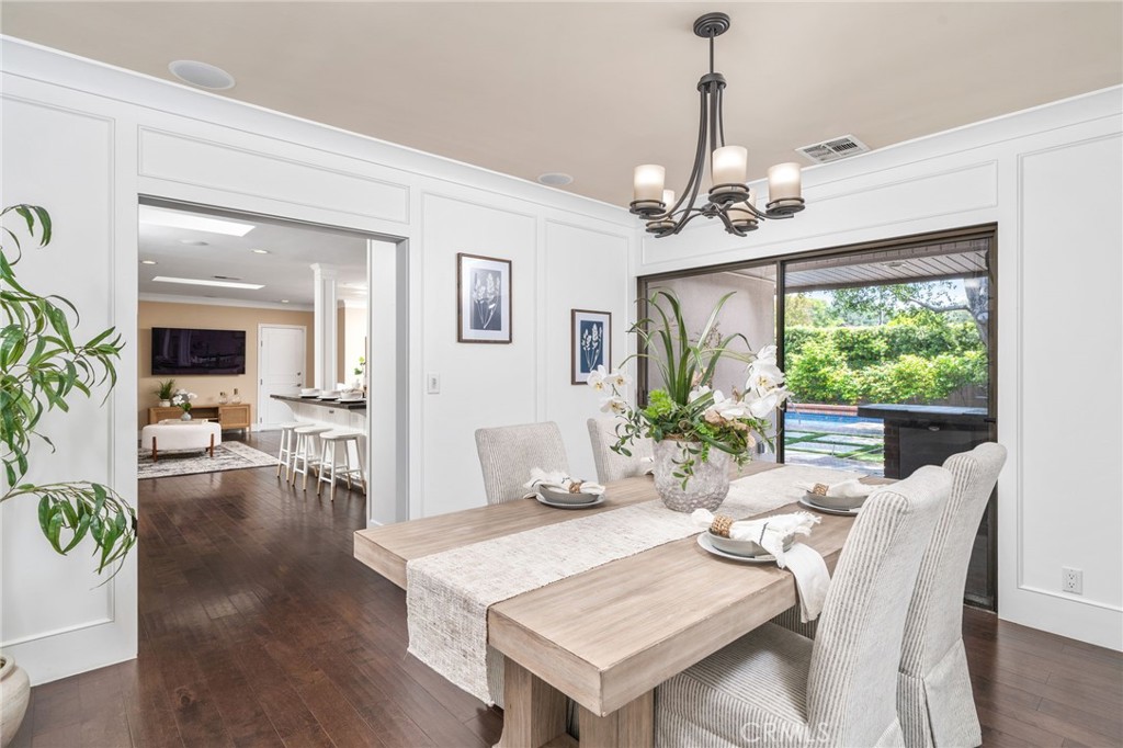 3343 San Pasqual Street Pasadena, CA 91107 - Photo 28 of 45 a view of a dining room with furniture window and wooden floor