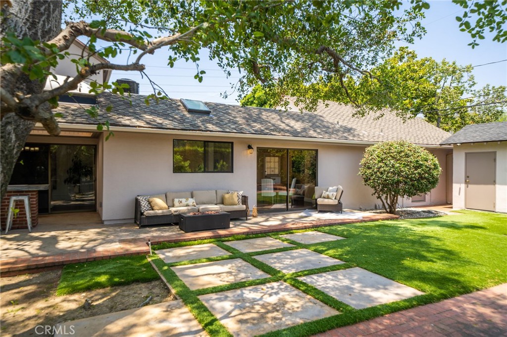 3343 San Pasqual Street Pasadena, CA 91107 - Photo 31 of 45 a front view of a house with a garden and patio