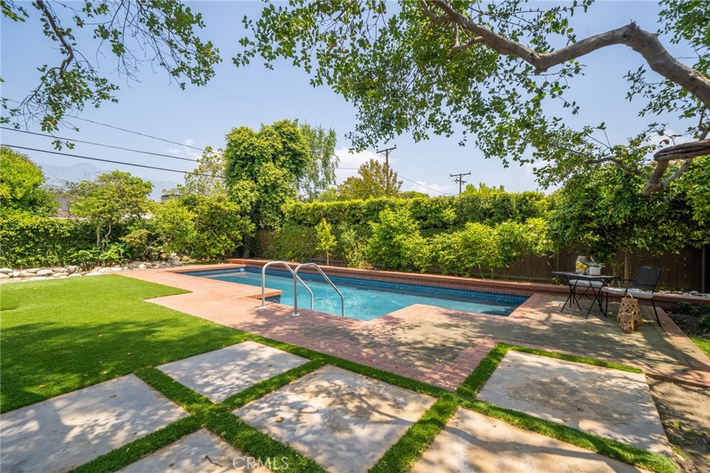 3343 San Pasqual Street Pasadena, CA 91107 - Photo 33 of 45 a view of a backyard with plants and a lake view