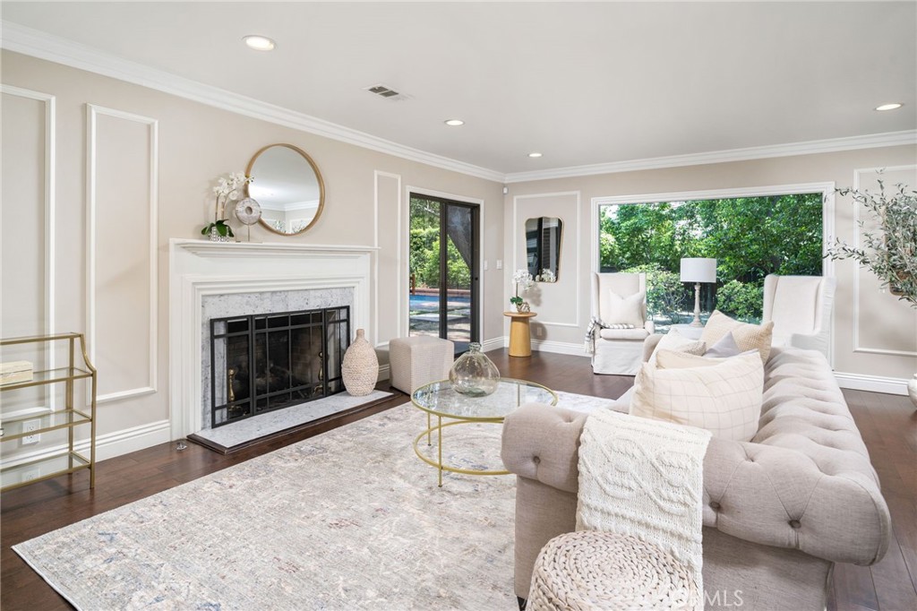 3343 San Pasqual Street Pasadena, CA 91107 - Photo 6 of 45 a living room with furniture a large window and a fireplace