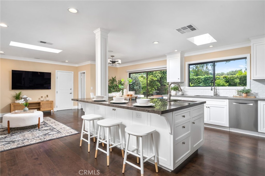 3343 San Pasqual Street Pasadena, CA 91107 - Photo 8 of 45 a living room with granite countertop furniture a flat screen tv and a large window