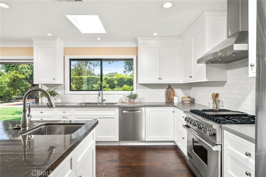 3343 San Pasqual Street Pasadena, CA 91107 - Photo 10 of 45 a kitchen with a sink white cabinets and appliances