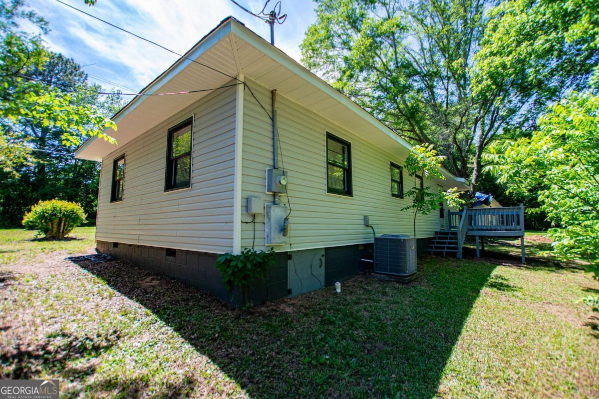 801 Bowdon Tyus Road Bowdon, GA 30108 - Photo 46 of 62 a view of a back yard of the house