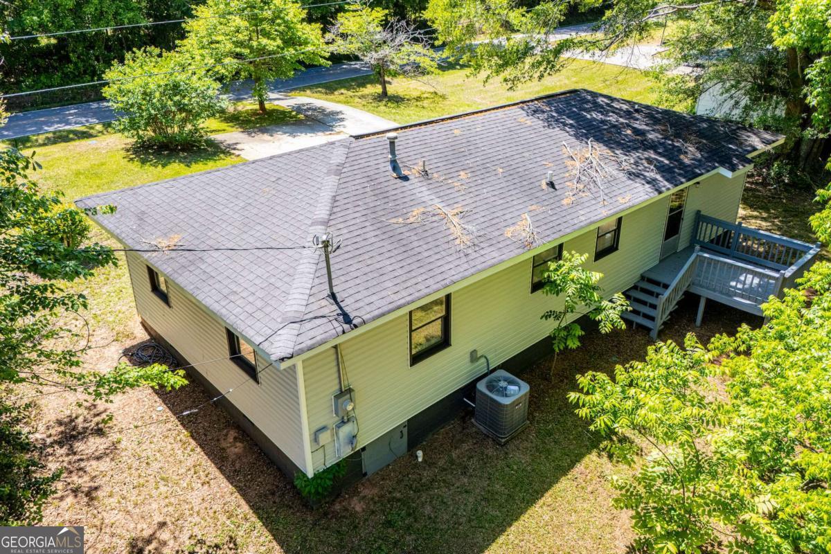 801 Bowdon Tyus Road Bowdon, GA 30108 - Photo 53 of 62 a aerial view of a house with a yard