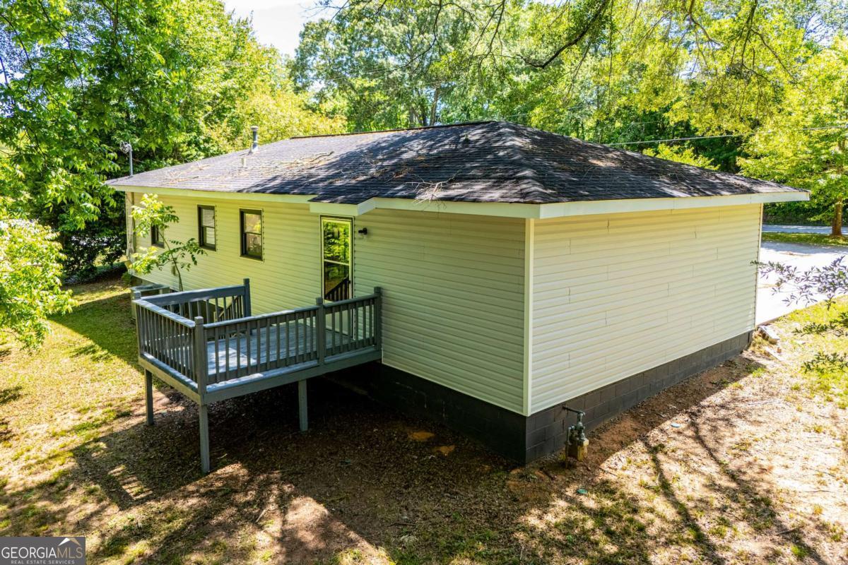 801 Bowdon Tyus Road Bowdon, GA 30108 - Photo 54 of 62 a view of a back yard of the house